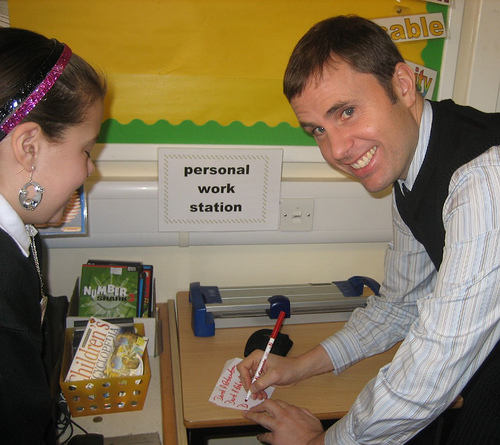 Derek signs autographs